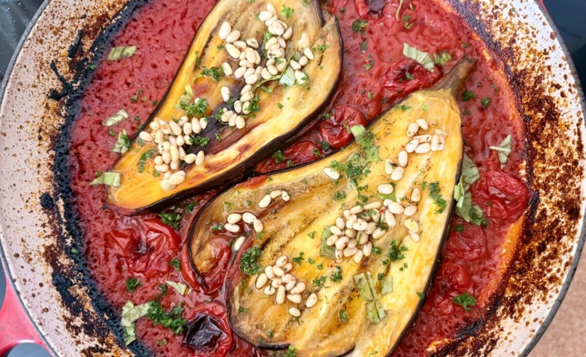 Fanned aubergines in tomato sauce