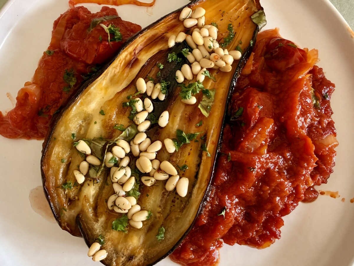 Fanned aubergine in tomato sauce